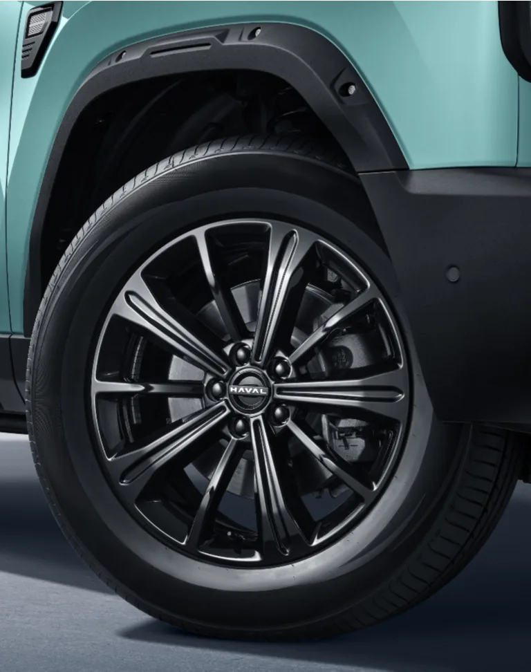 Haval H7 - detal felgi i nadkola przedniego koła